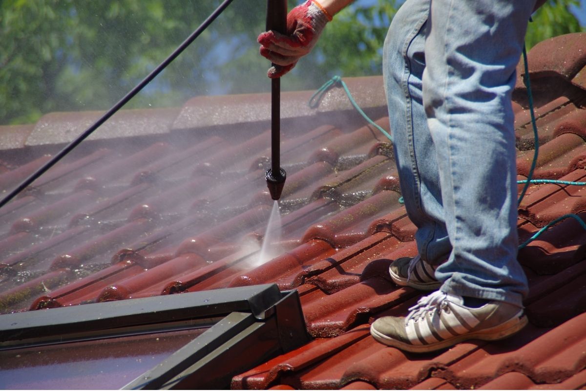 Roof pressure cleaning - tile roof and sunlight