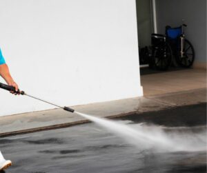Residential House Washing Stains On Concrete Driveway